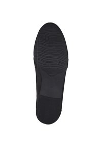 Suola nera di scarpa con superficie texture, caratterizzata da scanalature per la presa. Taglia 37 stampata sulla suola. Design semplice con finitura opaca.
