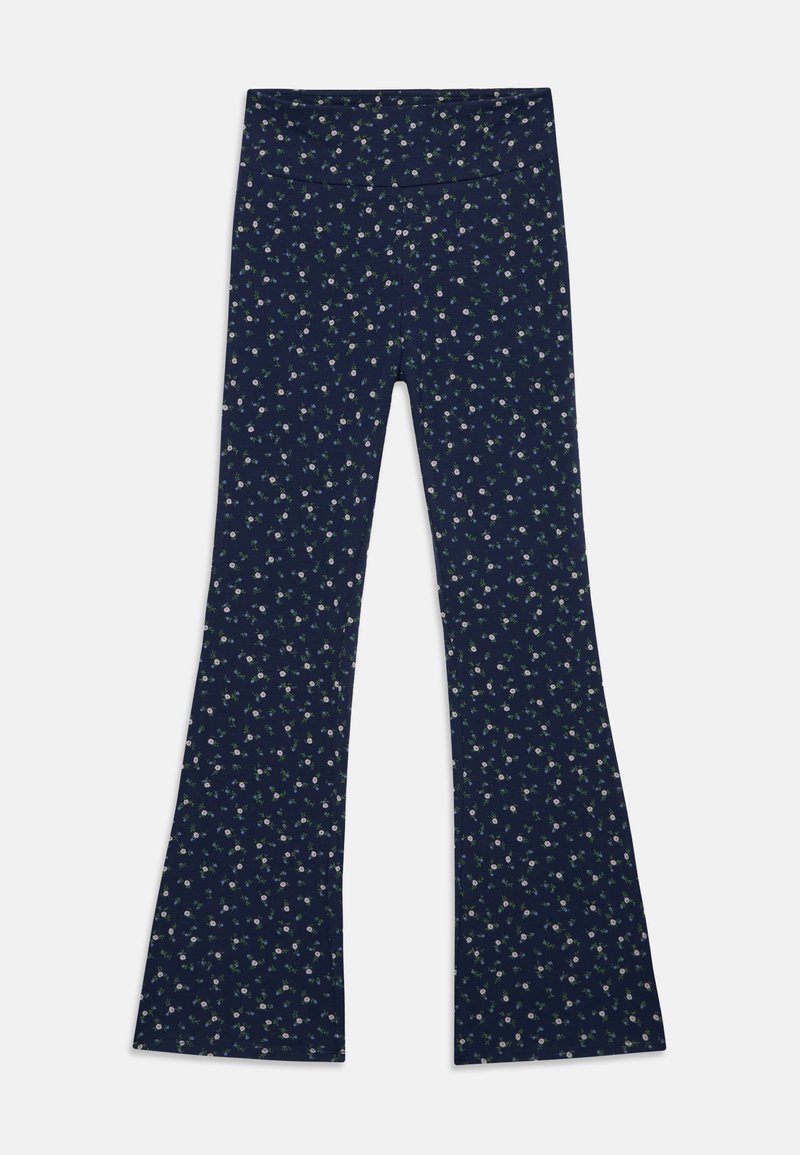 Leggings évasés bleu marine en tissu doux, ornés d'un petit motif floral avec des fleurs blanches et vertes.