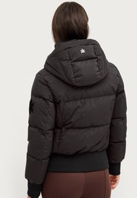 Áhkká Dunjakker - schwarz