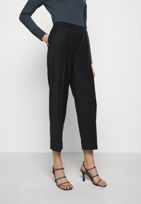 Filippa K Tygbyxor - black