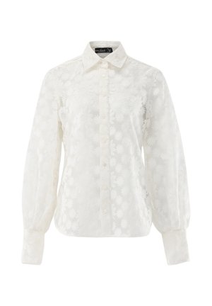 Weiße Bluse mit langen Ärmeln, Knopfleiste, floraler Spitzenmusterung und klassischem Kragen, ausgestattet mit leicht aufgeplusterten Ärmeln und geknöpften Manschetten.