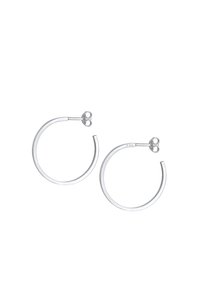 Pendientes de aro de plata con un acabado pulido, forma circular y un sutil detalle de cierre. Fabricados en metal duradero, con un diseño elegante.