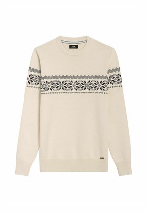 Jasnobeżowy sweter wykonany z dzianiny z czarnym geometrycznym wzorem na klatce piersiowej. Okrągły dekolt, długie rękawy oraz ściągacze przy rękawach i na dole.