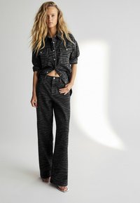 Next ZEBRA WIDE LEG   - Flared-farkut - washed black