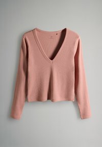 Svetloružový dlhý rukáv top s výstrihom do V a ribbovanou textúrou, s rovnomerným lemom a priliehavým strihom.