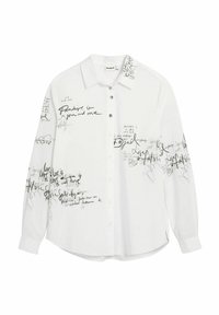 Valge pikamäe särk, millel on müüriks musta käekirja sarnane tekst ja abstraktsed mustrid. Esikäel nööbitav, ümar äär ja mansetiga varrukad.