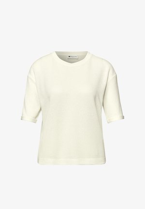 Krémově zbarvený pletený krátký rukáv s kulatým výstřihem a mírně zatočenými manžetami, vyrobený z texturované látky.