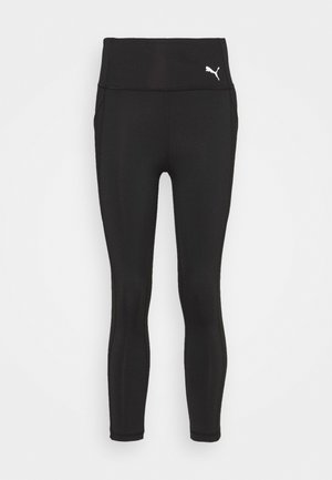 Leggings negros con una cintura alta, diseño ajustado, textura suave y un pequeño logotipo de Puma en blanco en el lado izquierdo.