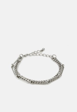 Silver metal bracelet featuring a mix of chain styles, including flat and twisted links, with an adjustable closure and decorative accents.