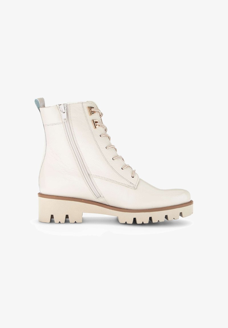 Witte leren enkelboots met een veter sluiting aan de voorkant, een rits aan de zijkant en een blokhak. Heeft een gestructureerde afwerking en een rubberen profielzool voor grip.