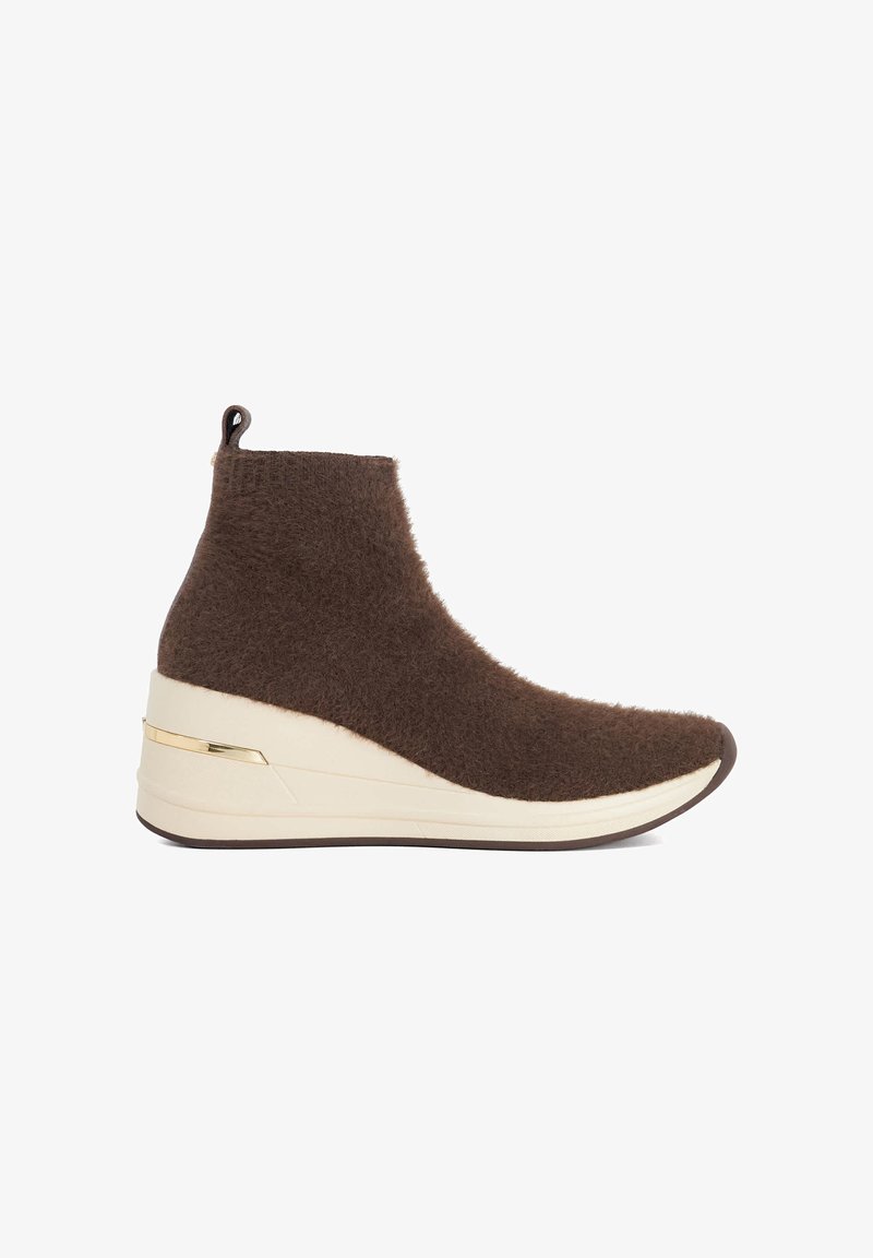 Brown fuzzy ankle boots with a wedge heel, featuring a cream sole and a gold accent stripe on the side. Smooth texture, minimalist design.