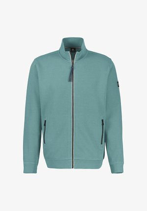 Light blue zip-up jacket in textured fabric features a high collar, two side pockets, and a decorative zipper pull. Black accents on zippers.