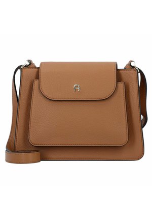 Tan leather handbag with a structured design, front flap, and a detachable shoulder strap. Features a small logo and contrasting stitching.