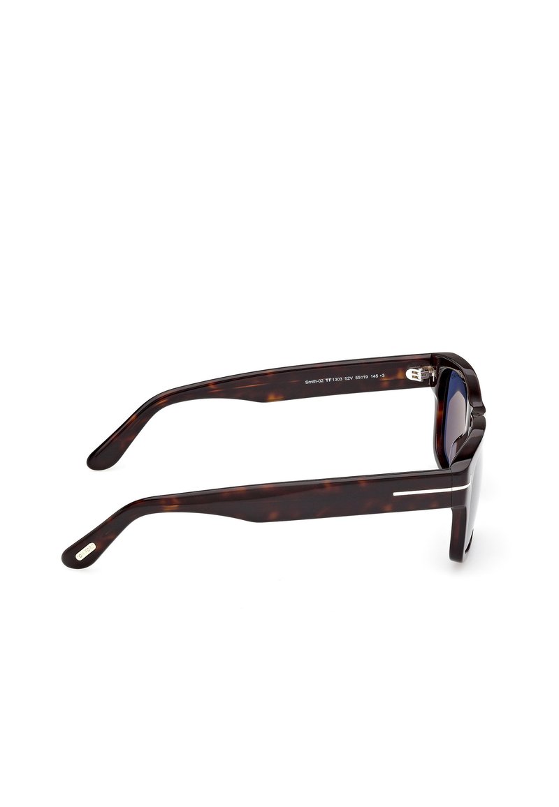 Tortoiseshell sunglasses with a thick plastic frame, rectangular lenses, and silver accents on the arms. Textured detailing throughout.