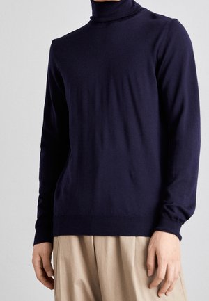 Navyblauer Rollkragenpullover aus weichem Stoff, mit langen Ärmeln und taillierter Passform. Glatte Textur mit gerippten Bündchen und Saum.