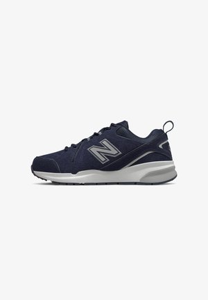 Navy blue athletic shoes with a textured fabric upper, reinforced toe, and a white cushioned sole; features a logo on the side.