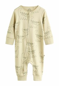 Combinaison pour bébé couleur beige clair en tissu doux, ornée d'un motif de dinosaure vert. Elle a des manches longues et une fermeture éclair sur le devant.