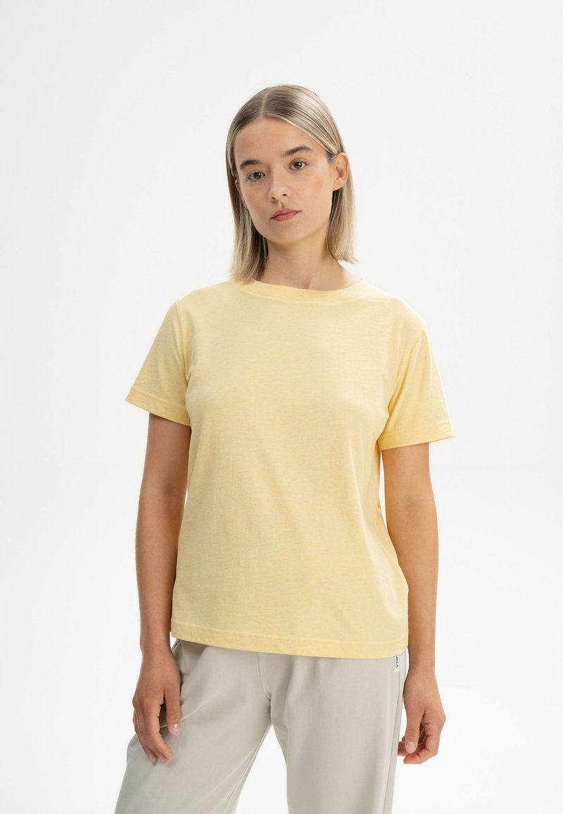 Geel katoenen T-shirt met korte mouwen, ronde halslijn en een relaxte pasvorm. Zachte, gestructureerde stof met een subtiel gemêleerd patroon.