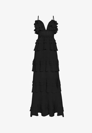 Sort maxi kjole med lagdelt flæse design, justerbare spaghettistropper og teksturerede detaljerne i kroppen. Flydende stof skaber bevægelse.