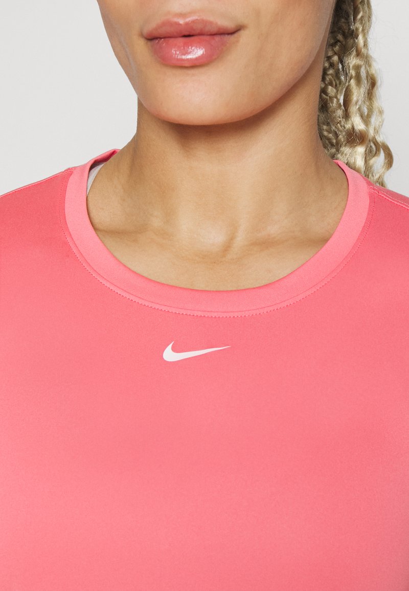coral nike top