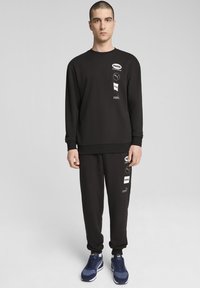 Puma POWER GRAPHIC  - Sweatshirt - black