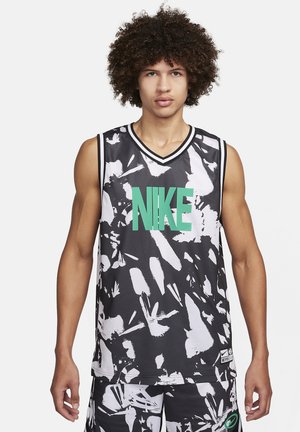 Camiseta de baloncesto Nike en negro con patrones abstractos blancos. Tiene un diseño sin mangas con escote en V y un prominente logo verde en la parte frontal.
