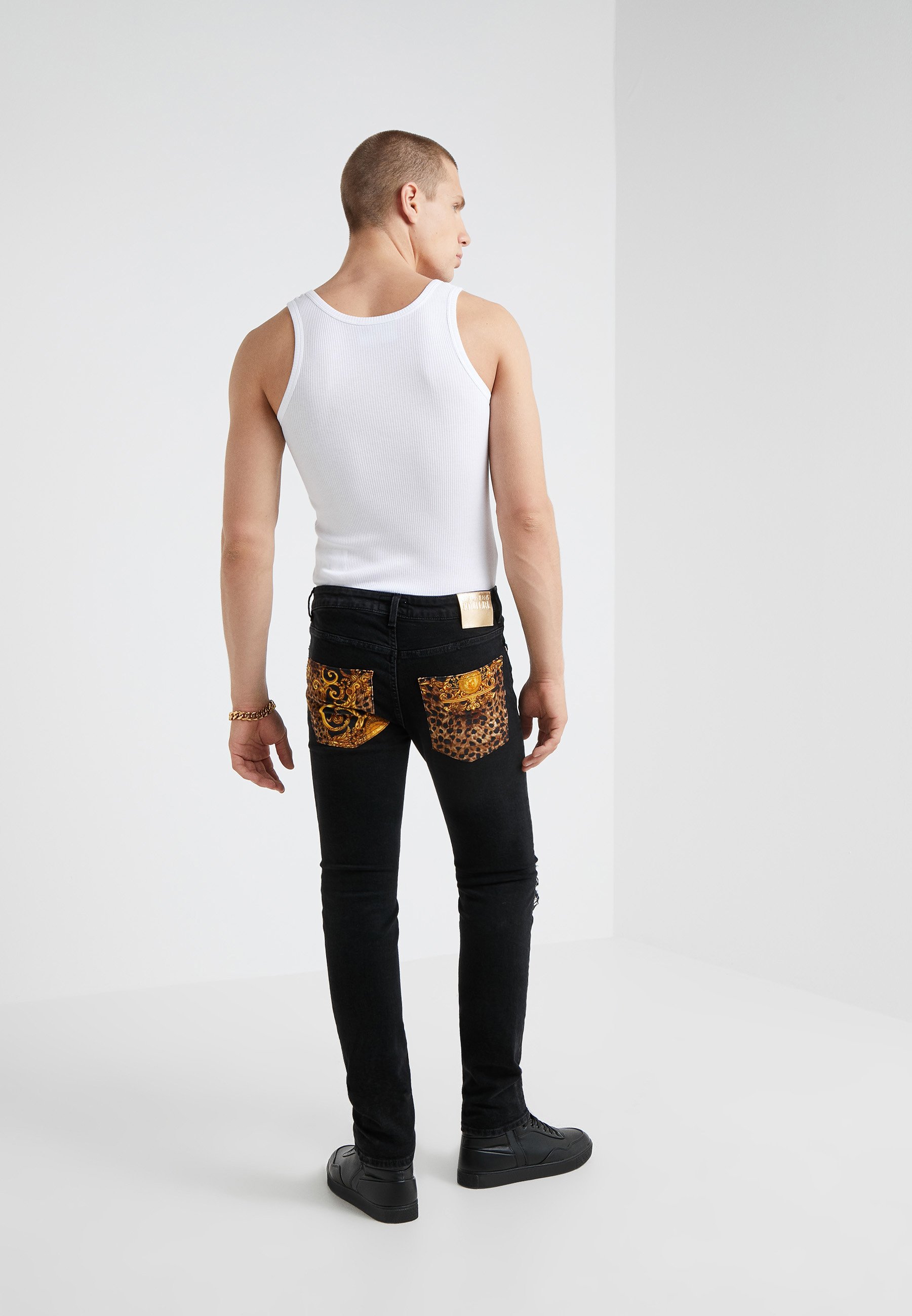 Pantaloni uomo versace Clearance