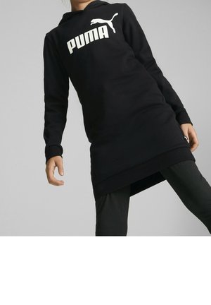 Black hooded sweatshirt dress with long sleeves, featuring a white Puma logo. Bottom hem has a slight asymmetrical cut. Soft fabric texture.