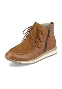 Bottes chelsea en cuir marron avec des accents en suède, lacées à l'avant, avec une fermeture éclair sur le côté, bout rond et semelle en caoutchouc blanc. Fini texturé.