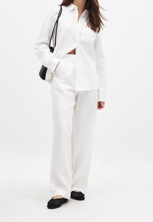 Spodnie materiałowe