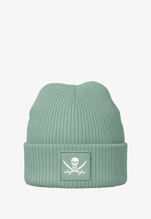 Mint green ribbed knit beanie featuring a white skull and crossbones patch on the front, with a soft texture and rounded top.