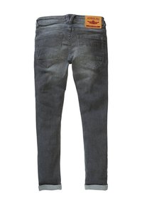Jeans in denim grigio scuro con vestibilità slim, dotati di un orlo ripiegato, due tasche posteriori e un'etichetta del marchio sulla cintura.