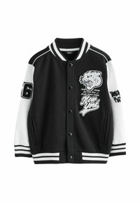 Giacca varsity nera con maniche bianche. Presenta una grafica di leone ricamata, accenti testuali e polsini e orlo a coste rigate. Chiusura frontale a scatti.