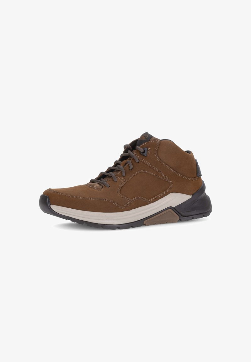 Brown suede hiking shoe with a textured finish, featuring black accents, a cushioned midsole, and a rugged rubber outsole for traction.