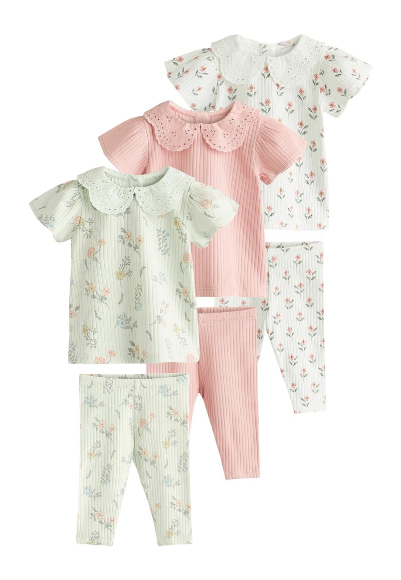 Sæt af børnetøj, der inkluderer to bluser og to par bukser. Features pastelfarver, blomster mønstre og dekorative kraver.