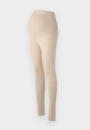 Leggings de maternidad beige con una cinturilla alta, fabricados con una tela suave y elástica, con un diseño ajustado y una textura suave.
