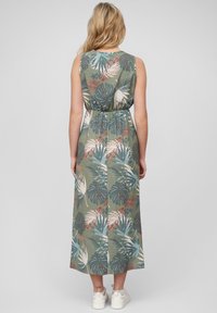 Sleeveless maxi dress in olive green with a tropical leaf pattern in blue, pink, and white. Features an elastic waist and falls to mid-calf.