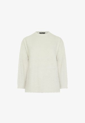 Suéter blanco texturizado con mangas largas y cuello redondo. La tela parece suave y peluda, sin patrones ni adornos visibles.