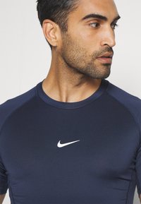 Nike Performance TIGHT - Sportfelső - obsidian/white