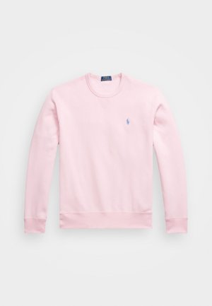 Svetlo roza sweatshirt iz bombaža, z okroglim izrezom, dolgimi rokavi in majhnim modrim logotipom na levem prsnem delu.
