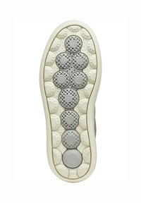 Semelle de basket légère en crème et gris, avec des motifs de semelle circulaires et une surface texturée pour une meilleure adhérence et stabilité.