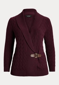 Burgundy knit cardigan with a shawl collar, featuring a cable pattern, ribbed cuffs, and a brown leather belt with a gold buckle.