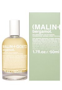 Bergamot Eau de Parfum in einer klaren Glasflasche mit einem weißen Deckel. Die Schachtel ist hellgrün mit weißen Schriftzügen, die Details zur Duftkomposition und zum Volumen angeben.