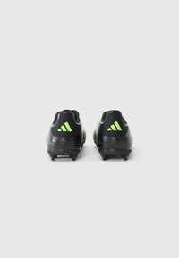 adidas Performance F50 LEAGUE - Chaussures de football pour terrain sec - core black/iron metal-coloured/lucid lemon