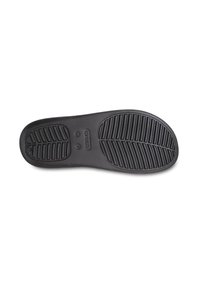 Schwarze Gummisohle von Crocs mit strukturiertem Muster für Halt, mit einer gerundeten Form und Markenlogo. Entworfen für Langlebigkeit und Komfort.