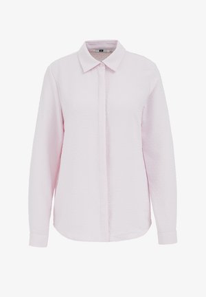 Hele roosa pikkade varrukatega särk, millel on kraega kaelus, ees nööbitav ja tekstuuriga kangas, millel on väikesed reljeefsed täpid.