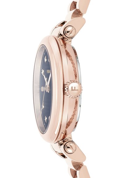 Rose gold metal watch with a blue dial, diamond accents, and a round case. Features a textured crown and link bracelet design.