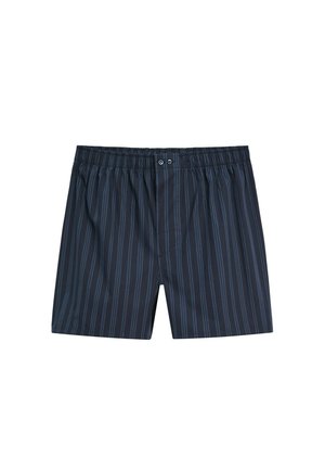 Boxer bleu foncé avec fines rayures verticales bleu clair et une ceinture élastique avec deux petits boutons au centre devant.