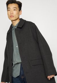 Tommy Hilfiger SLIM BLEECKER OLAVI - Calças de ganga de perna direita - olavi indigo