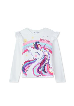 Camicia bianca a maniche lunghe con grafiche di unicorno, con una criniera multicolore e scintillante e dettagli arricciati sulle spalle. Il testo recita "Unicorn."